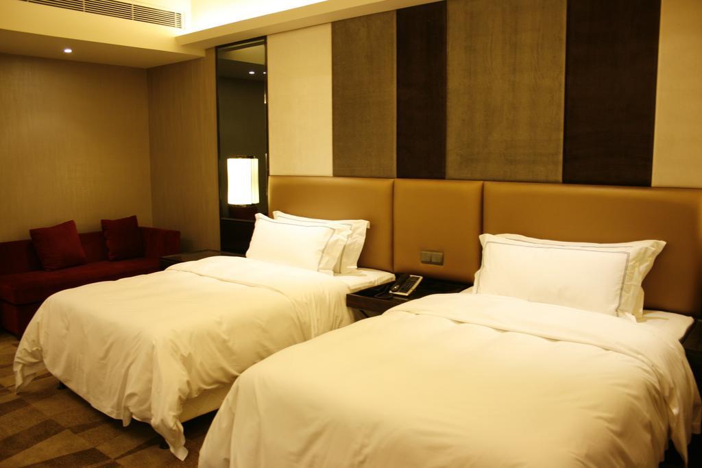 Royal Suites & Towers Wuhan Habitación foto